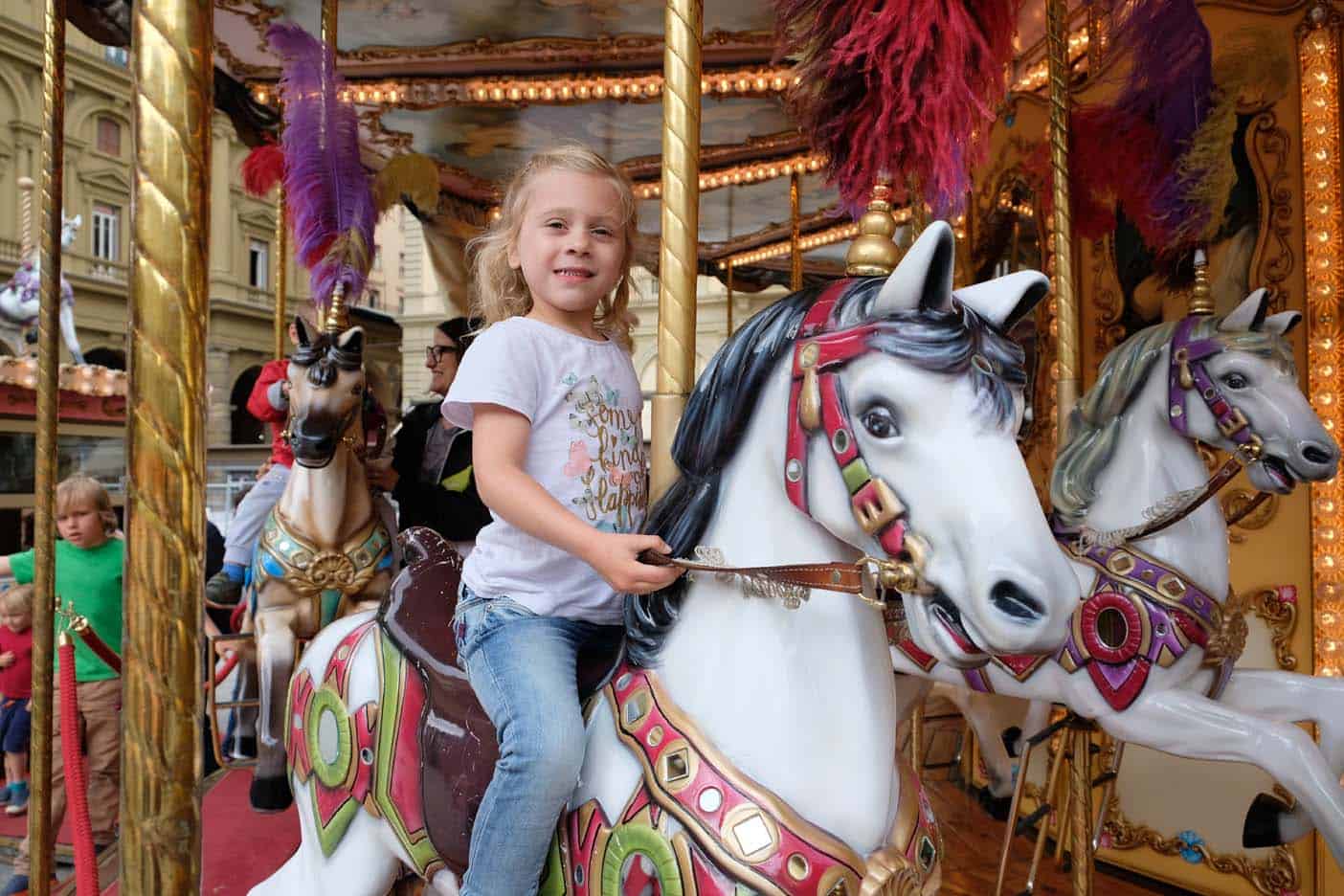 florence met kinderen draaimolen